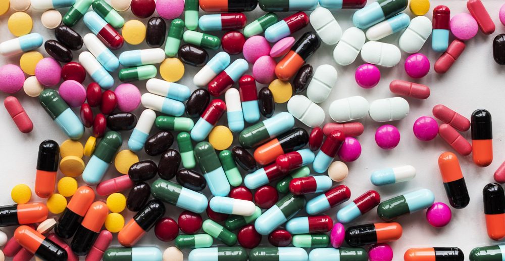 Aerial view of various medical pills pharmaceutical